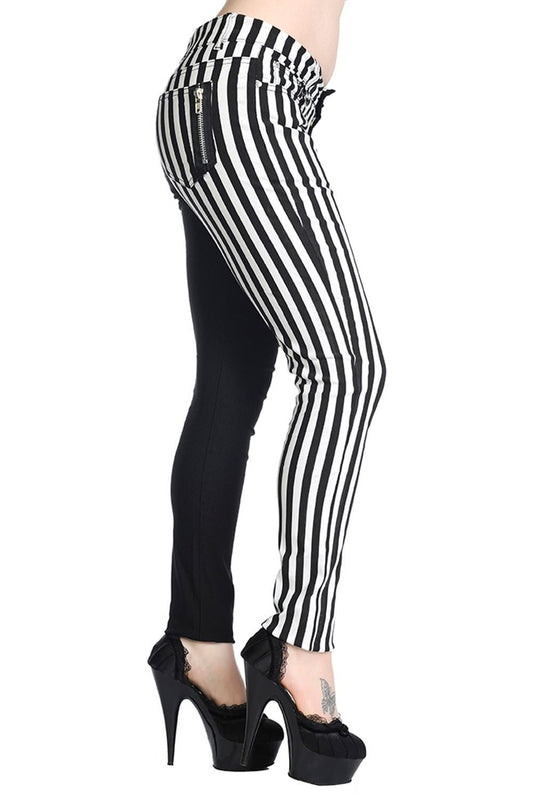 Half striped and half black low rise trousers.