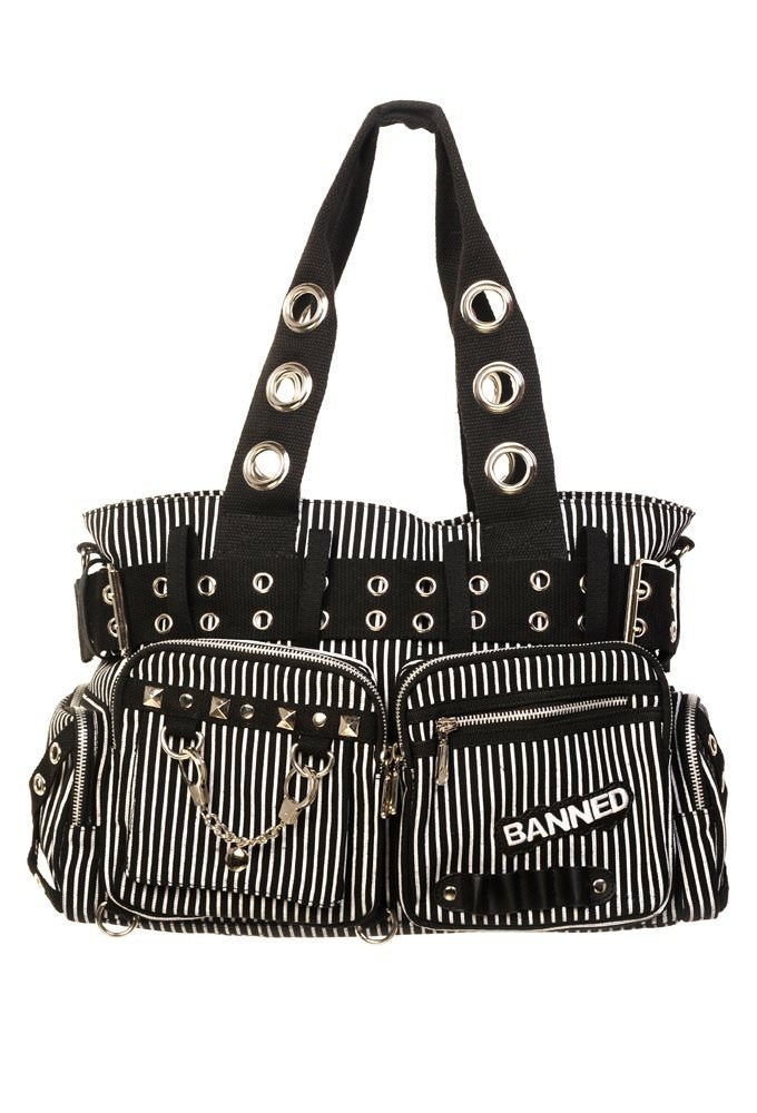 Black and white shoulder handbag with studs, handcuff charm and banned embroidered into pouch.