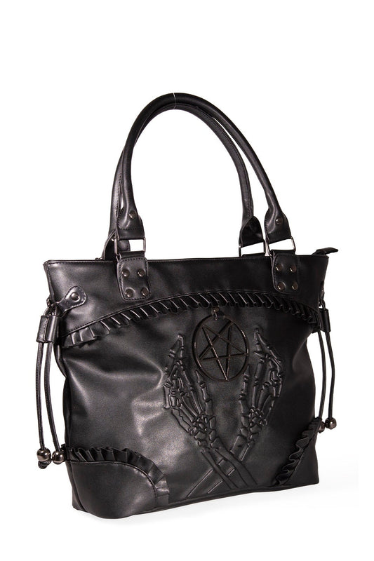 Black tote styled hand bag with black frills, embossed skeleton hands and pentagram.