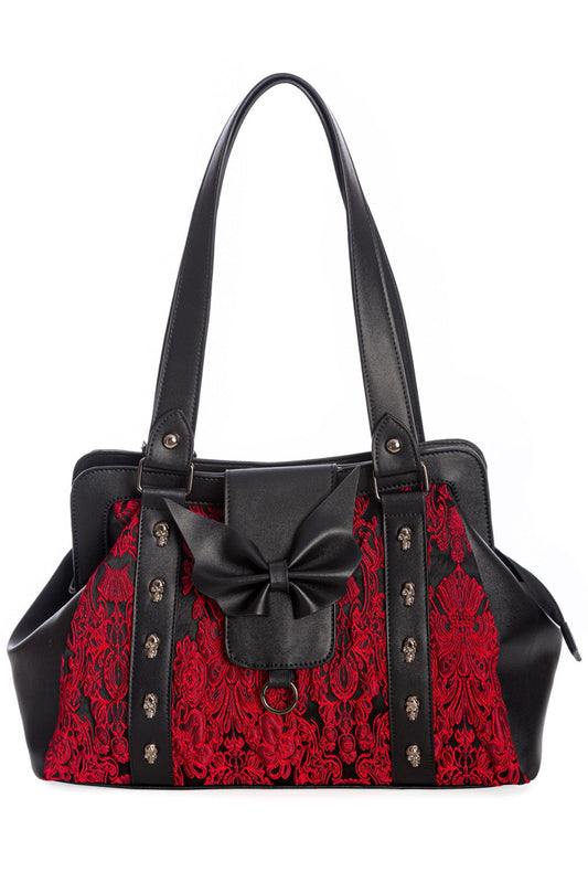 Black and red shoulder bag with skull studs, lace features and black matte bow.