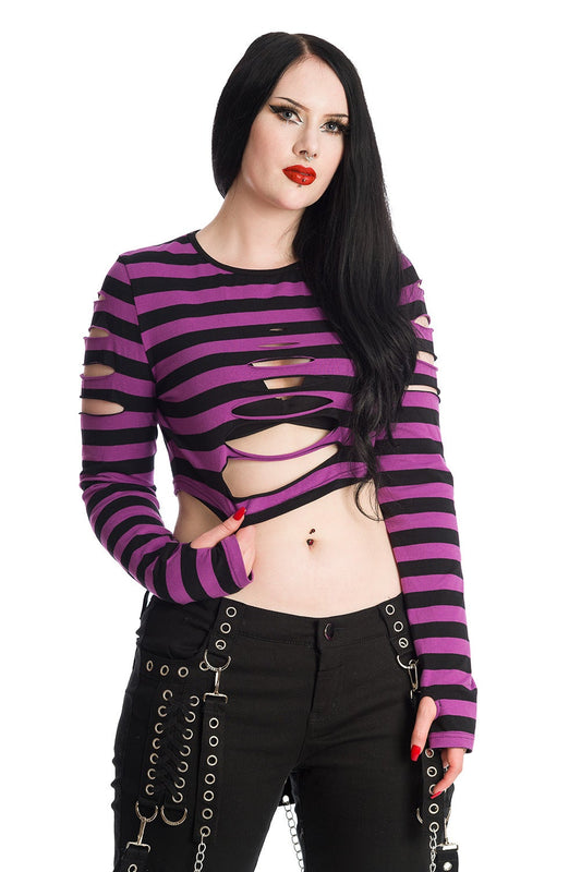 Alternative model in long sleeved crop top with ripped details in black and purple stripe