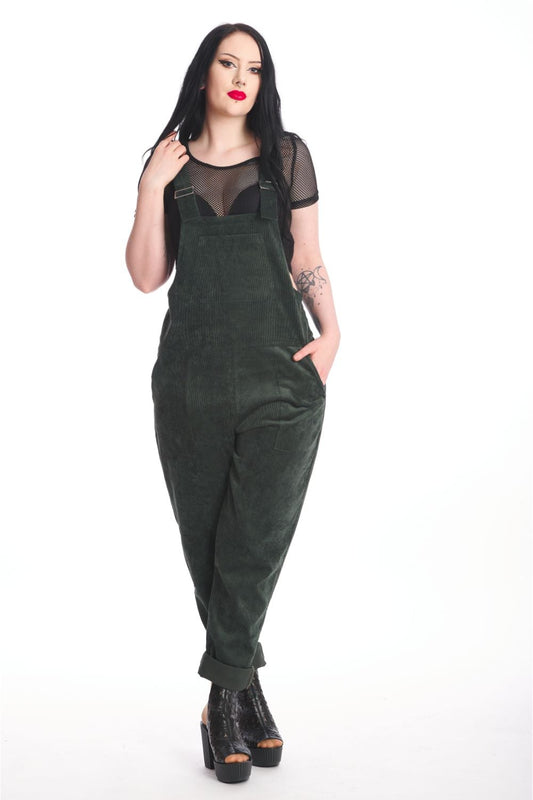 Alternative model in moss green dungarees with black mesh crop top underneath.