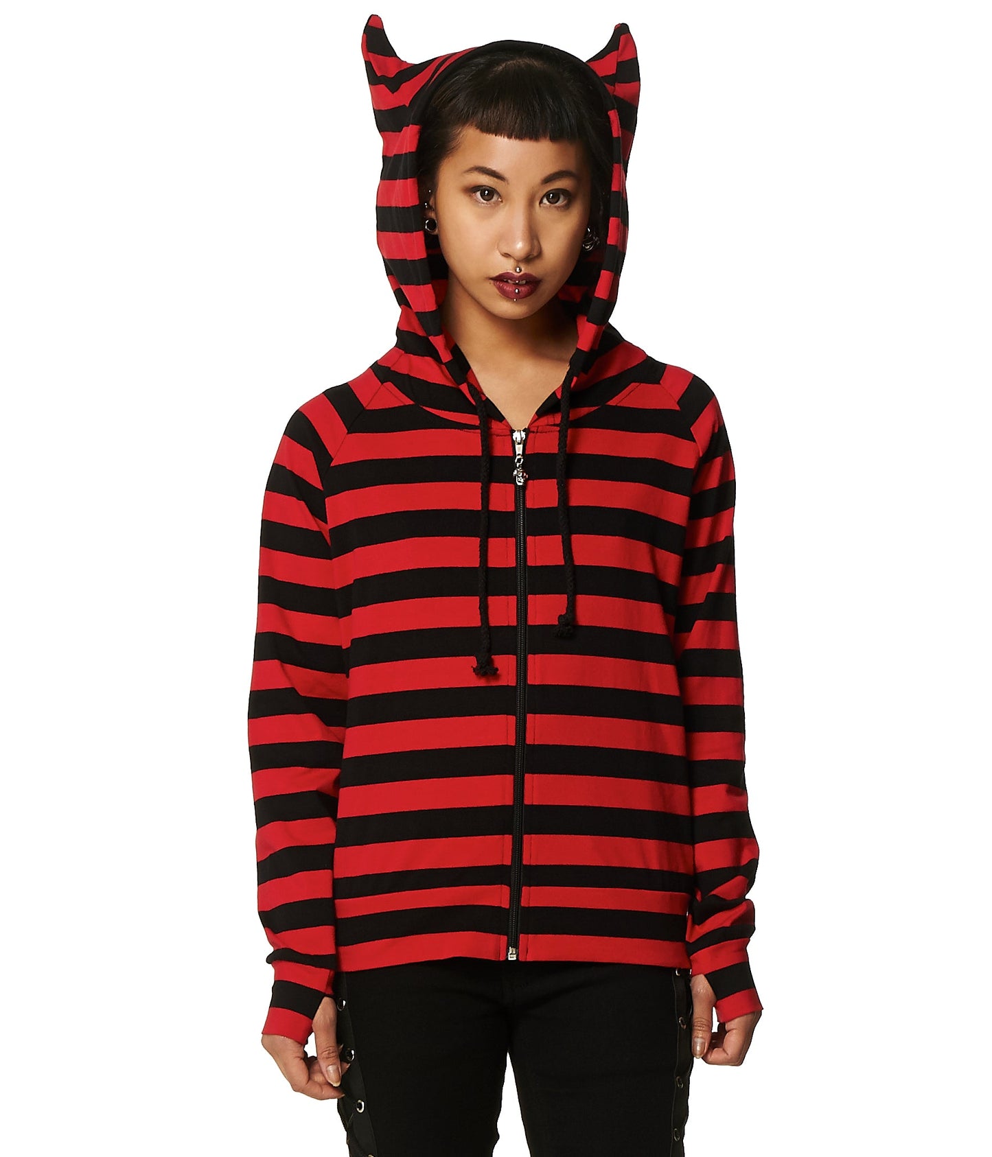 Alternative model in striped black and red hoodie with cat ear hood.