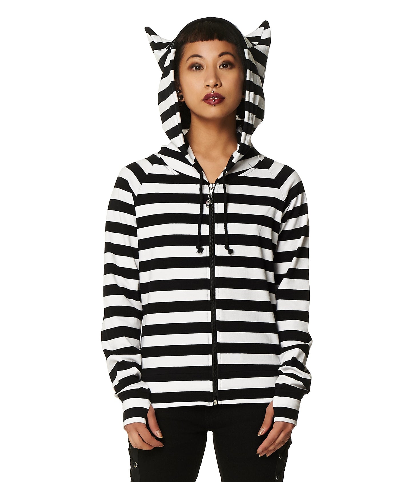 Alternative model in striped black and white hoodie with cat ear hood.