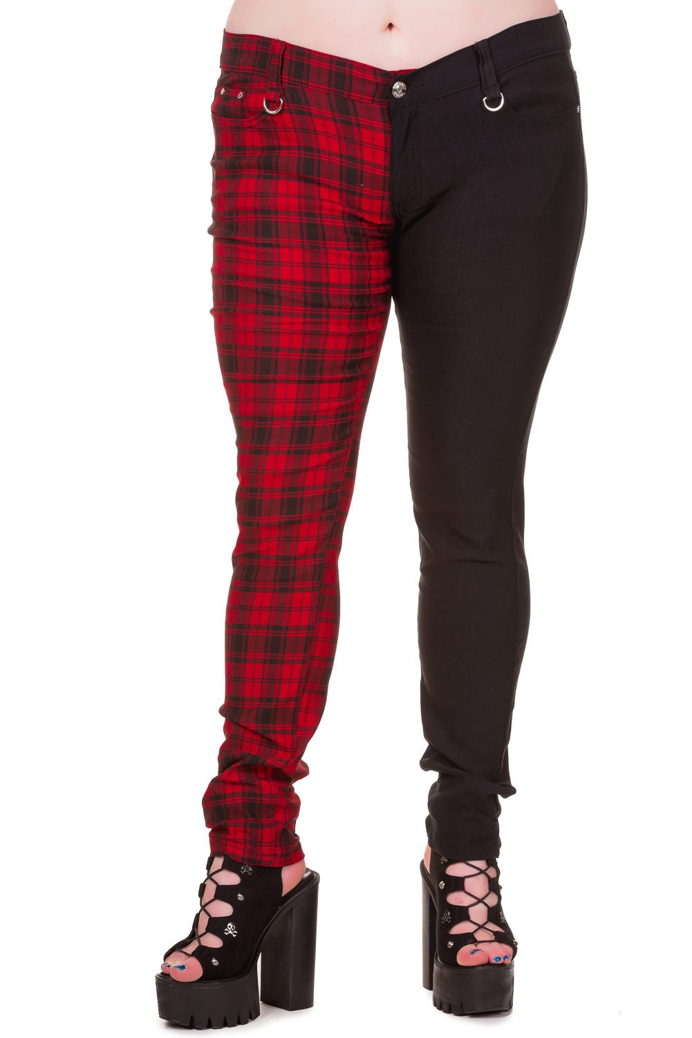 Red tartan check trousers with one leg black, low rise. 