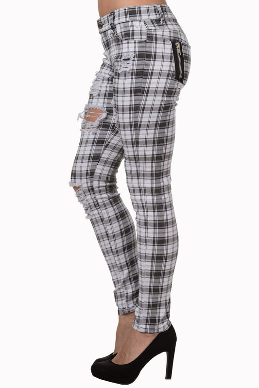 Black and white tartan check trousers low rise with rips.