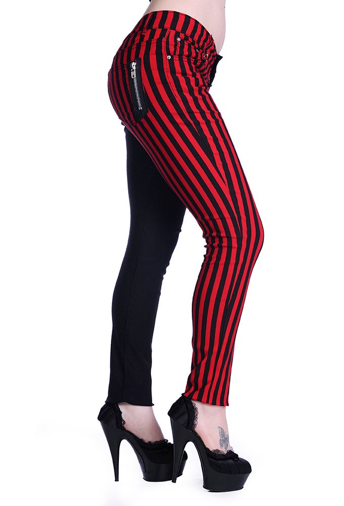 Half red striped and half black low rise trousers. 