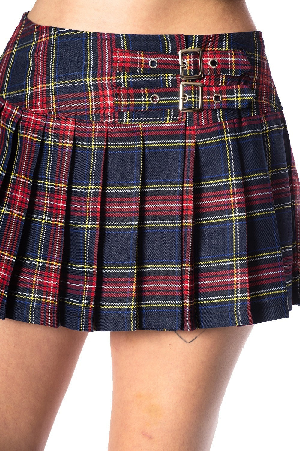 Close up shot of navy and red tartan mini skirt with buckle features. 