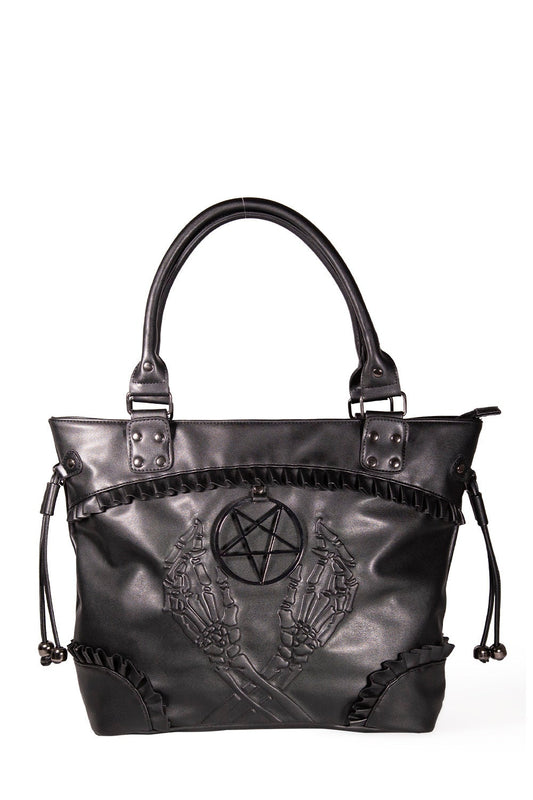 Black tote styled hand bag with black frills, embossed skeleton hands and pentagram.