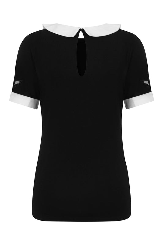 Back of black short sleeved top with white collar and cuffs. Keyhole button and bat shaped mesh panels on each sleeve. 