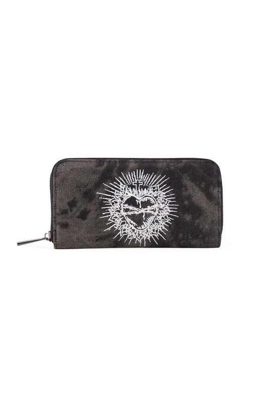 A distressed black pure with sacred hear embroidered on the centre.