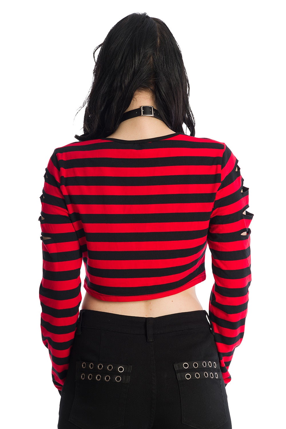 Alternative model in long sleeved crop top with ripped details in black and red stripe 