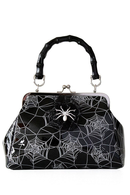 Black patent handbag with spider web print and spider detail