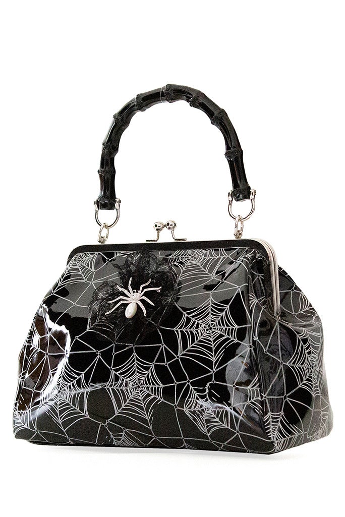 Black patent handbag with spider web print and spider detail 