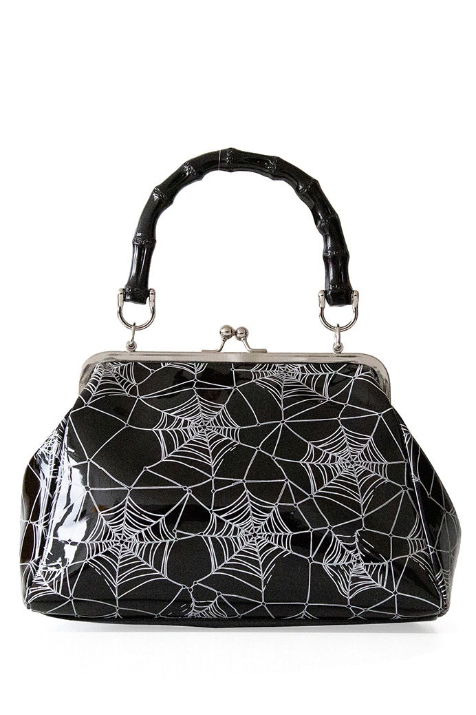 Black patent handbag with spider web print and spider detail 