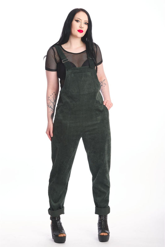 Alternative model in moss green dungarees with black mesh crop top underneath.