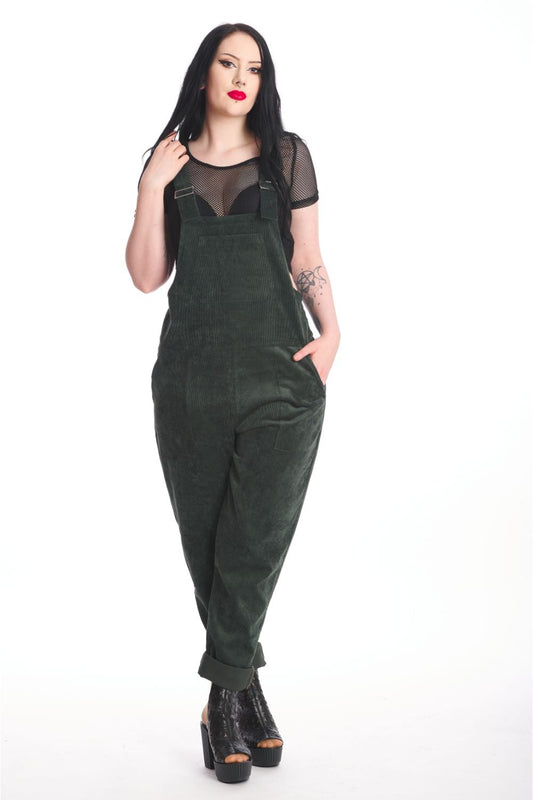 Alternative model in moss green dungarees with black mesh crop top underneath. 