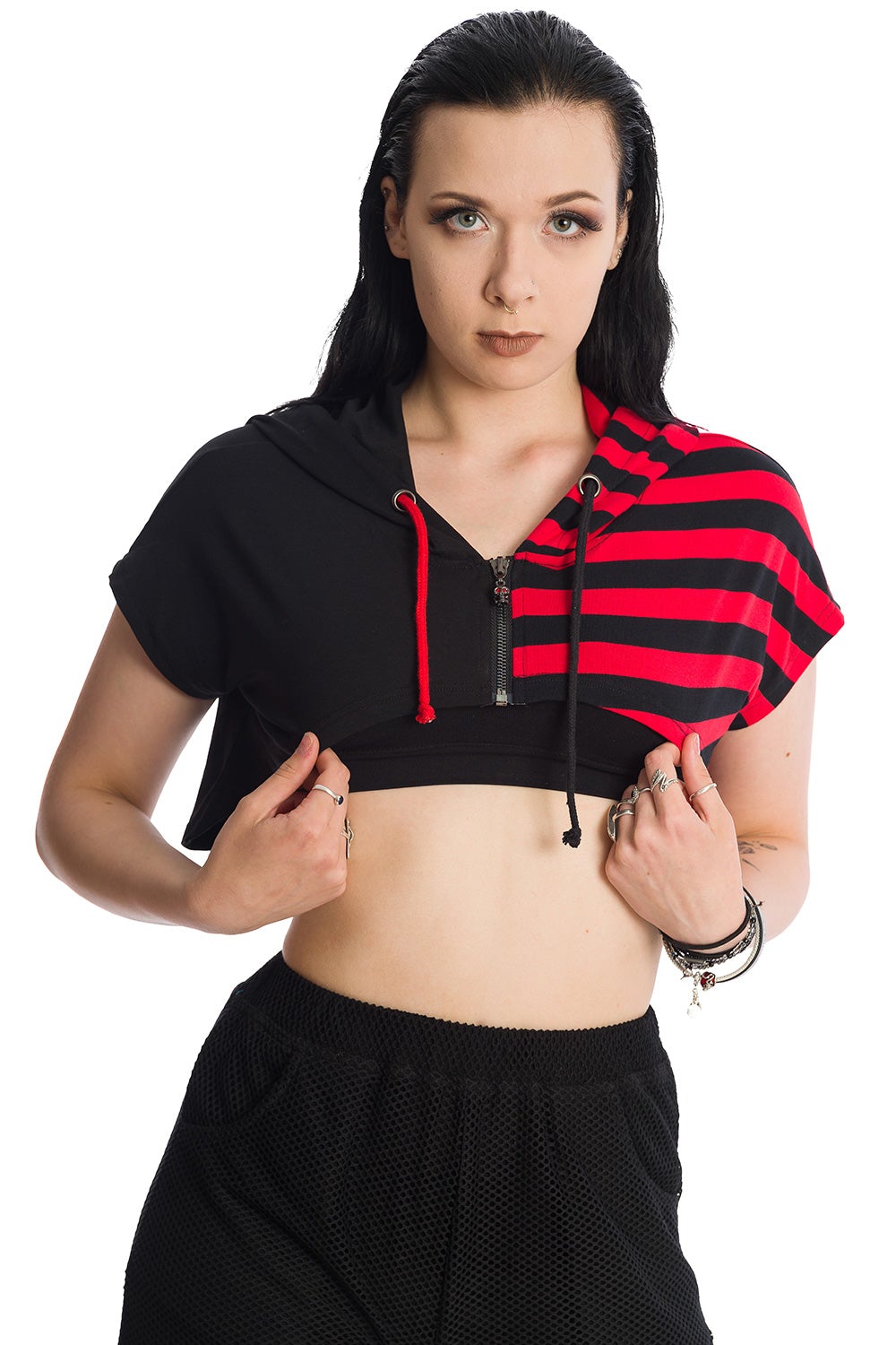 Alternative model in cropped half red strip and half black hoodie
