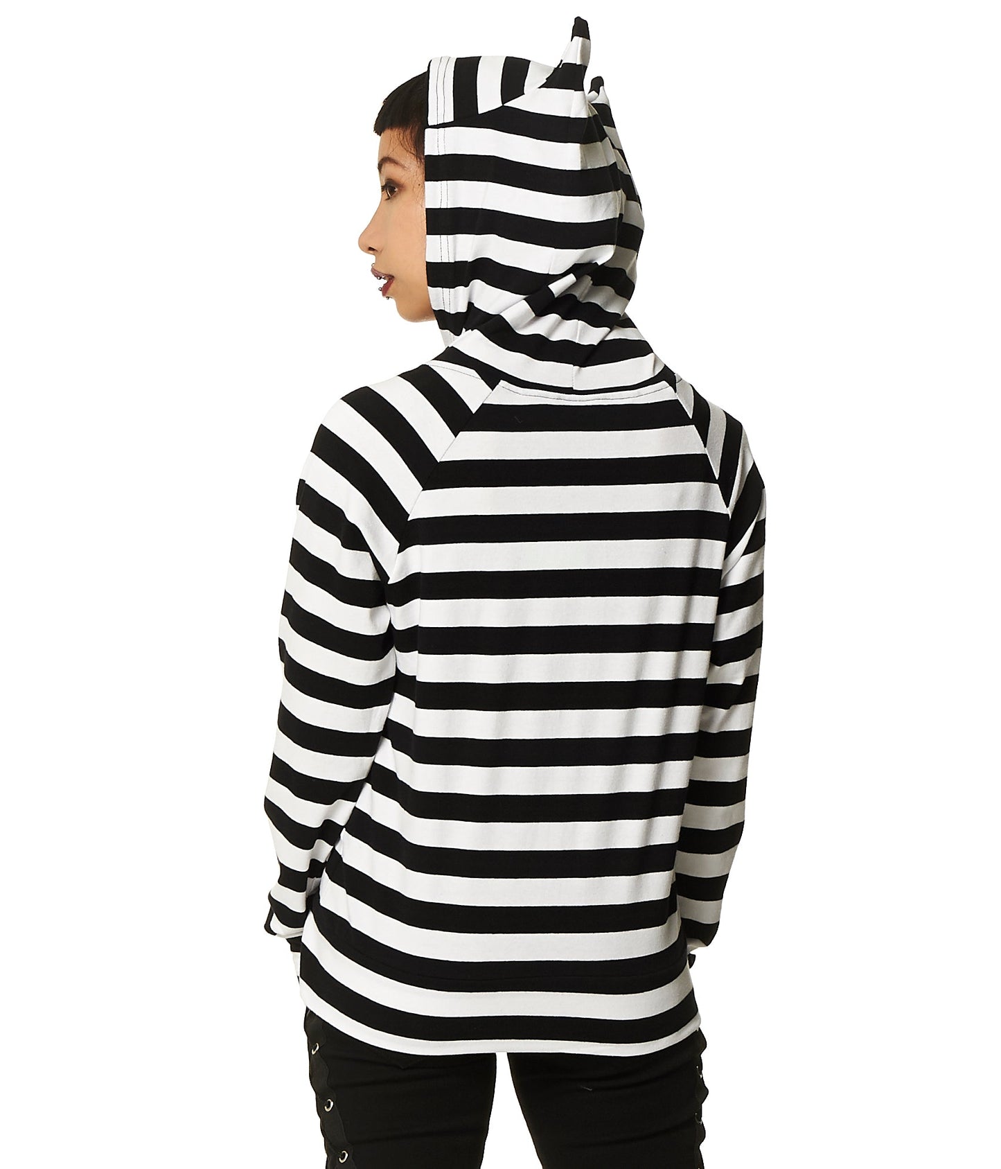 Alternative model in striped black and white hoodie with cat ear hood.